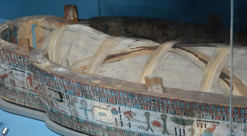 Vividly painted ancient Egyptian sarcophagus with hieroglyphics